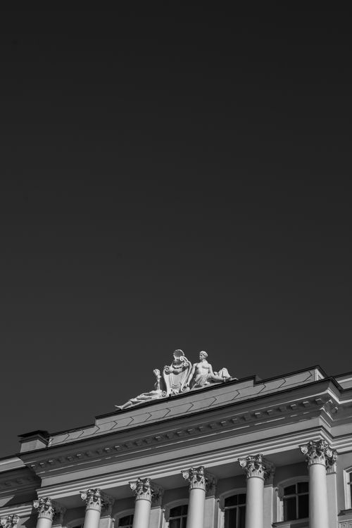 Free Black and white photo of a neoclassical building with statues in St. Petersburg, FL. Stock Photo