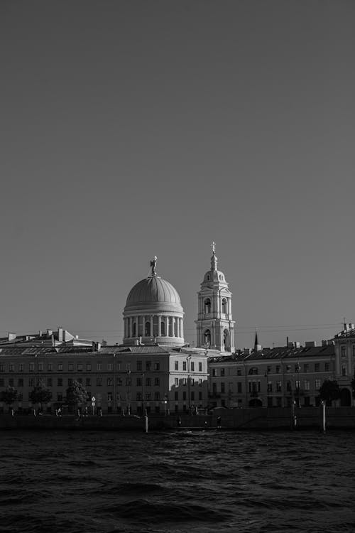 Black and White Photo of the Waterfront Buildings 
