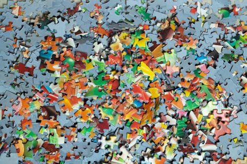 Pile of colorful puzzle pieces 