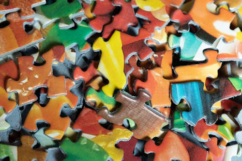Pile of colourful puzzle pieces