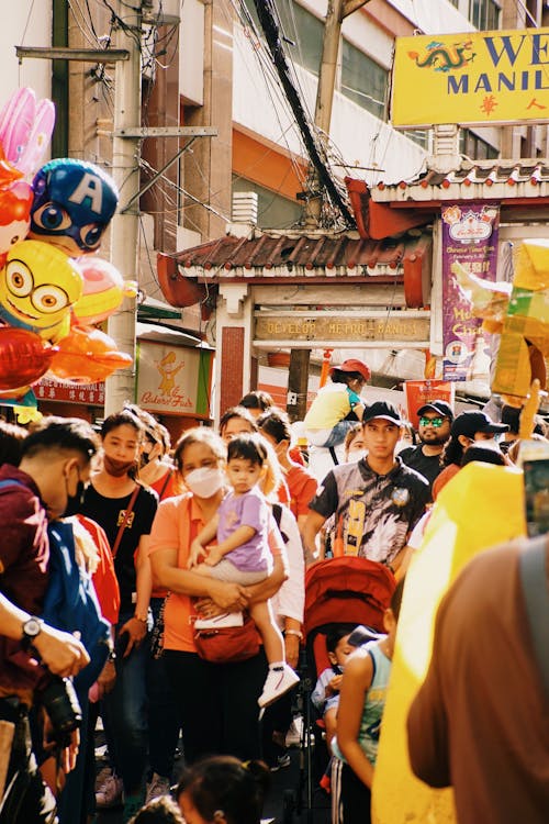 People Walking on a Busy Street 