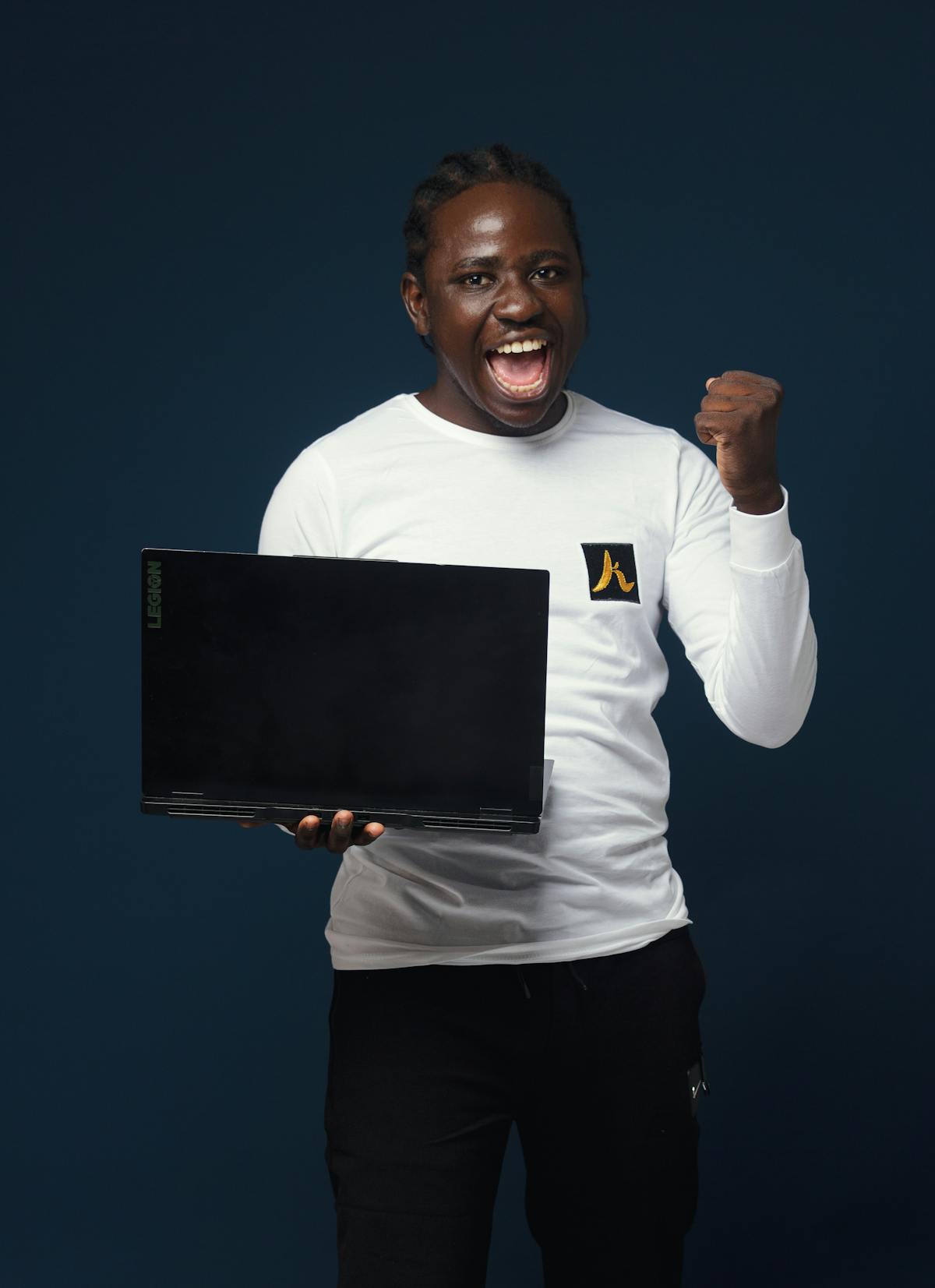 A Dark Guy Holding A Laptop Happy Photos, Download The BEST Free A Dark Guy Holding A Laptop