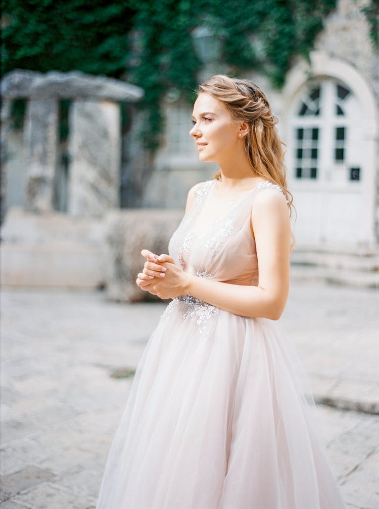 Elegant Bride In Wedding Dress Outdoors