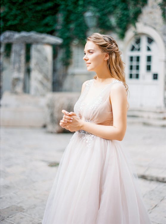 Elegant Bride in Wedding Dress Outdoors · Free Stock Photo
