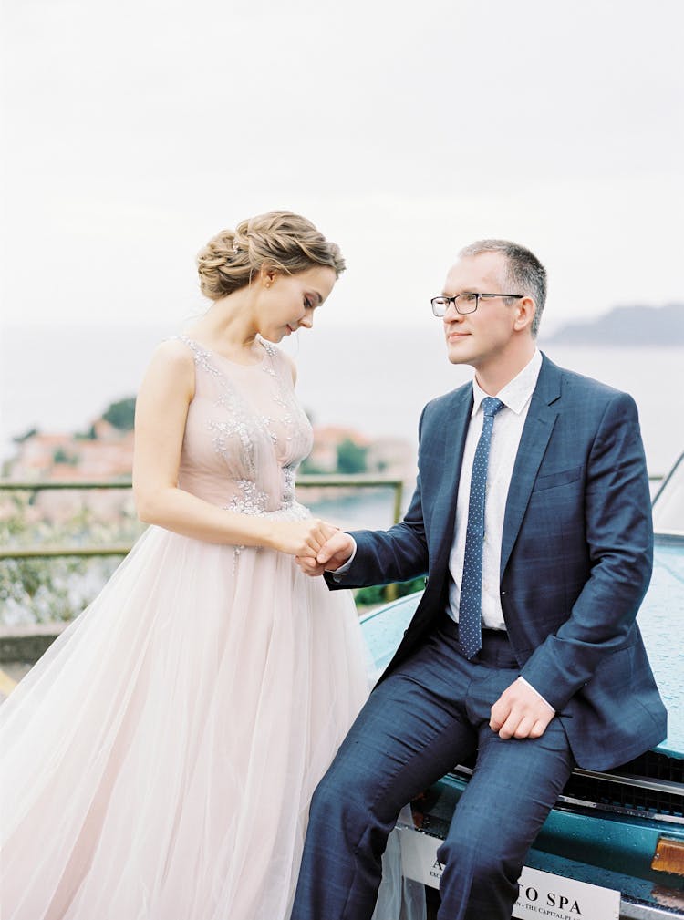 Bride And Groom Holding Hands At Marriage Ceremony