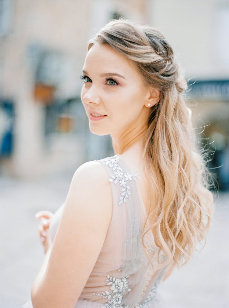 Elegant Bride In Wedding Dress Outdoors