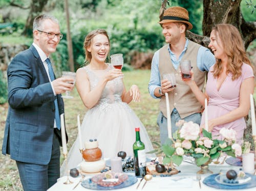 Women and Men Celebrating Wedding