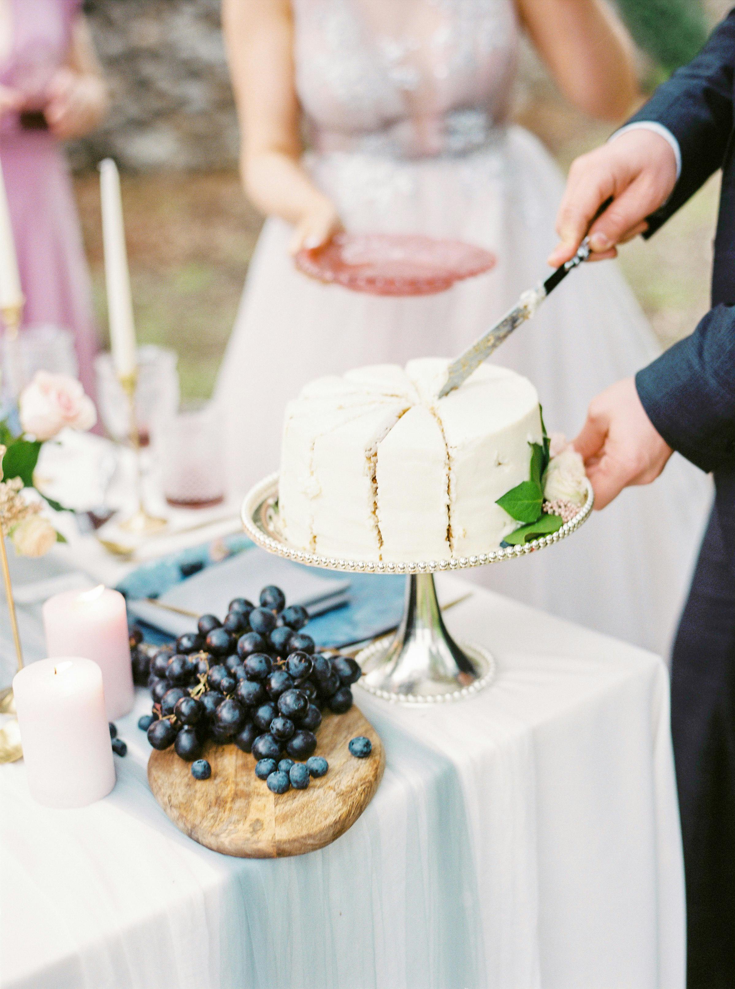 Couple cutting cake for wedding and engagement days, abstract Stock Photo |  Adobe Stock