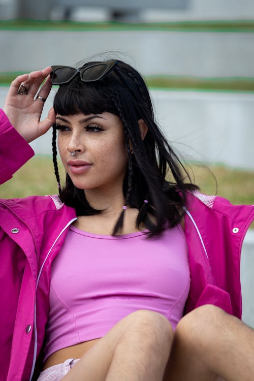 Brunette Woman in Pink Jacket and Top