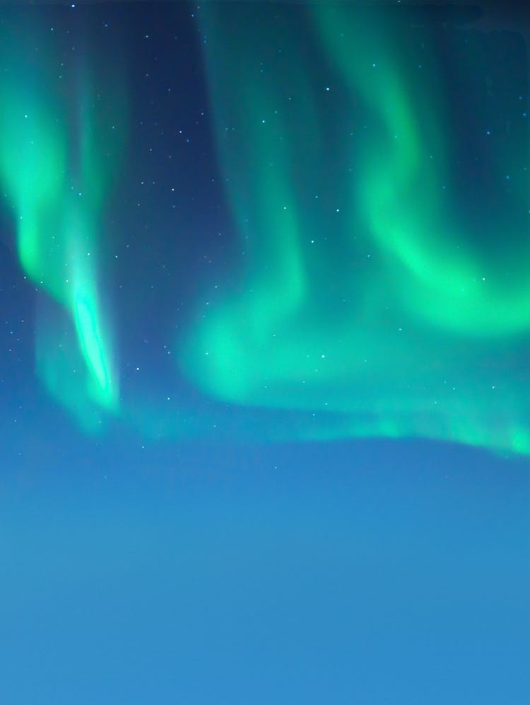 Aurora And Stars On Night Sky