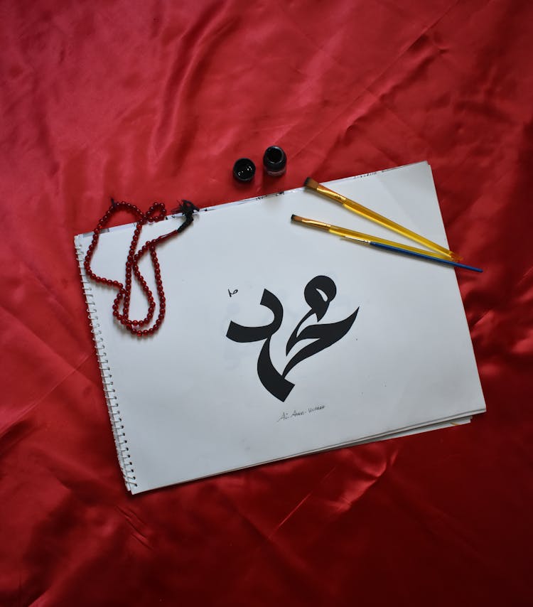 Arabian Character Written In A Stationery 