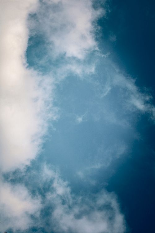 Free Blue sky and fluffy clouds create a dreamy cloudscape over Azerbaijan. Stock Photo