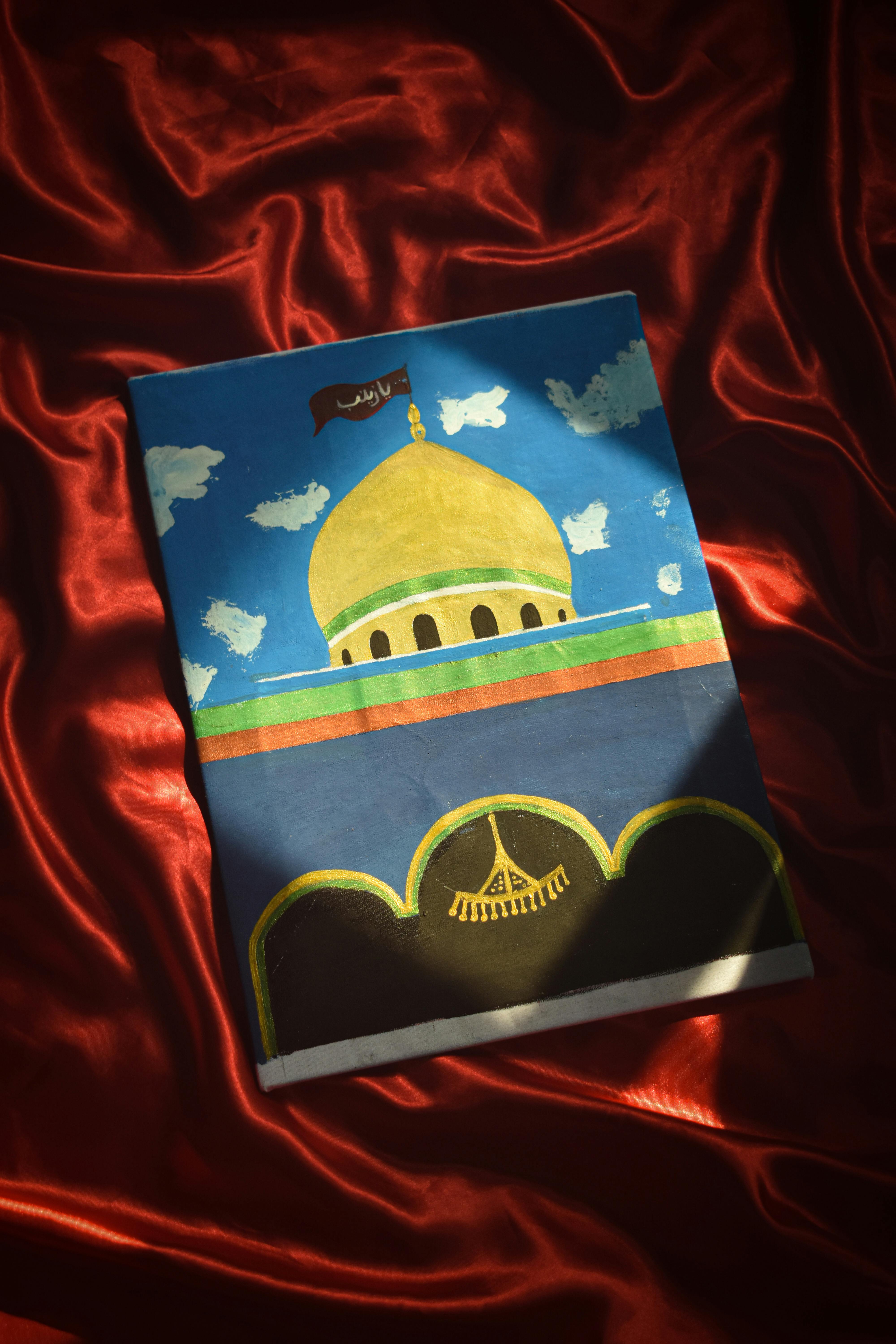 Vibrant painting of a mosque dome on red fabric, with artistic flair.