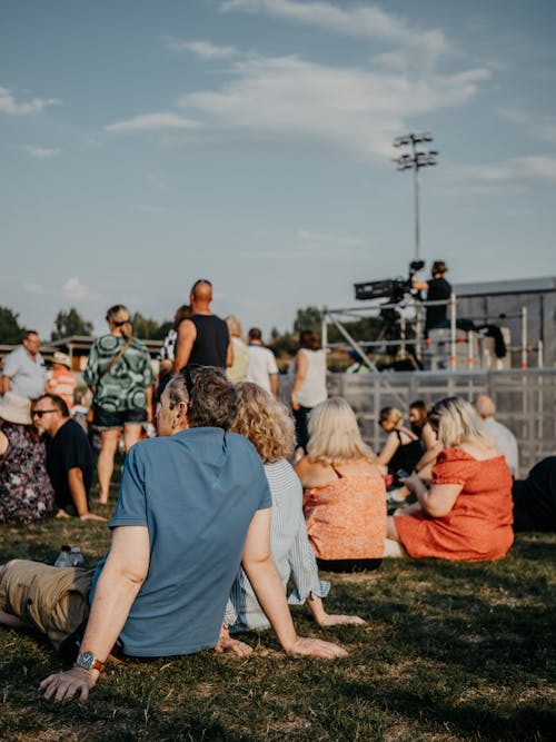 People Sitting on Grass