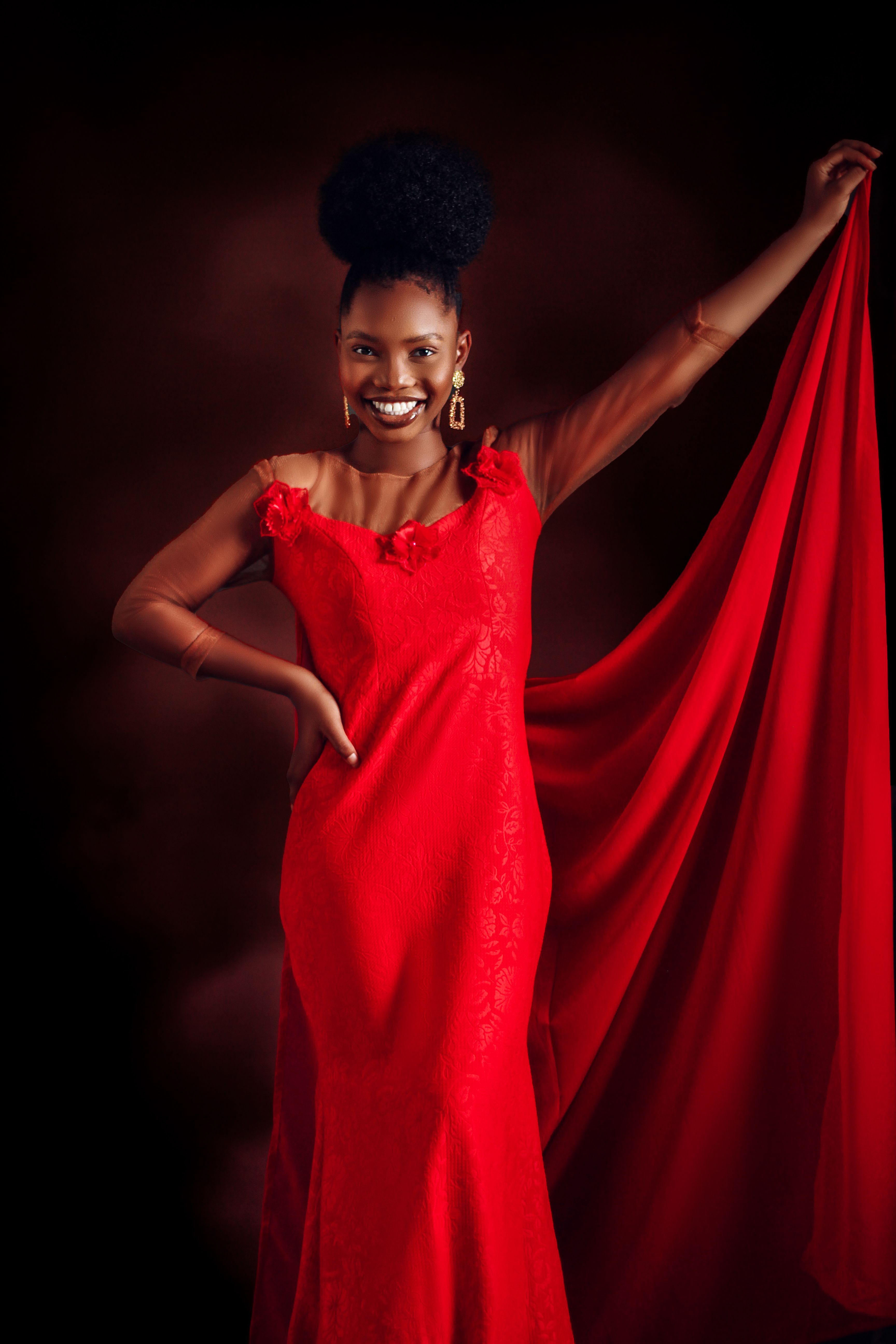 Young Woman Posing in a Red Dress · Free Stock Photo