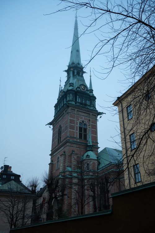 Free Low angle shot of Riddarholmen Church spire against a clear sky in Stockholm. Stock Photo