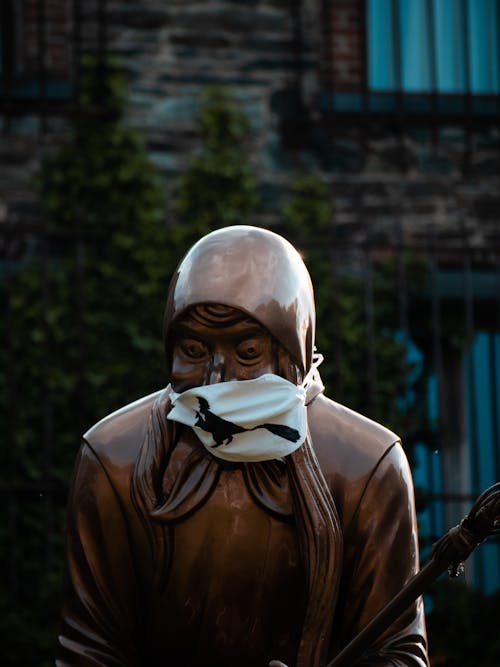 Face Mask on a Bronze Sculpture 