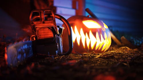 Free stock photo of axe, chainsaw, halloween