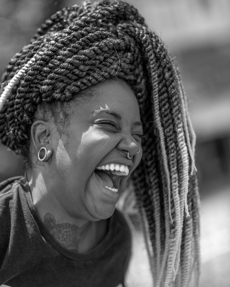 Laughing Woman With Tied Dreadlocks