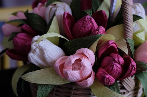 Artificial Flowers in a Woven Basket
