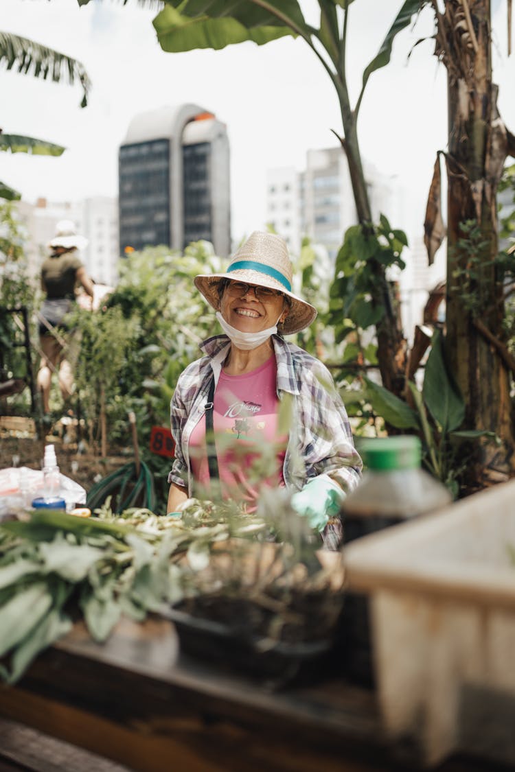 Smiling Woman In A Garden 