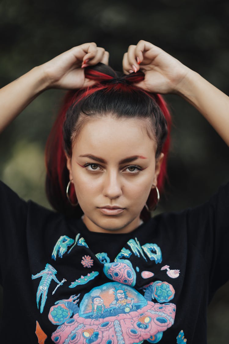 Portrait Of Woman Tying Hair