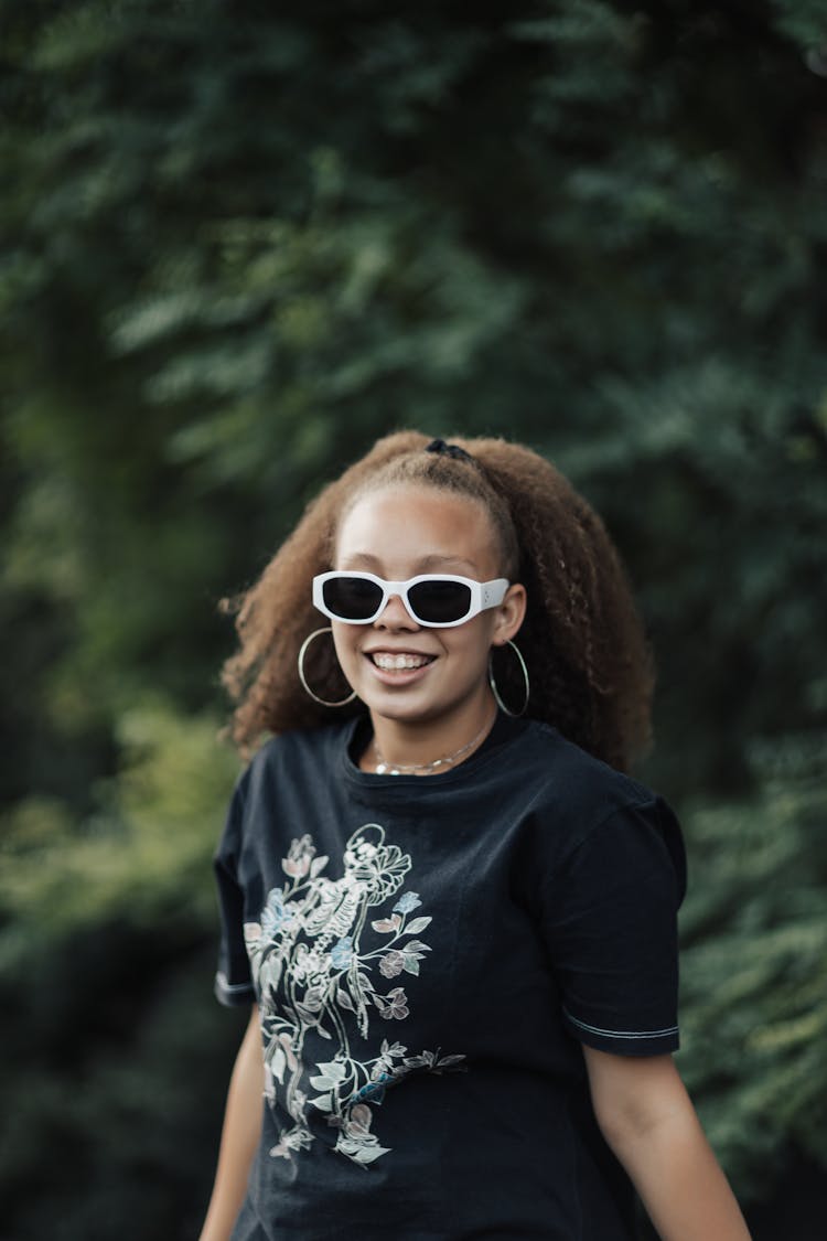 Portrait Of A Girl Wearing Sunglasses 