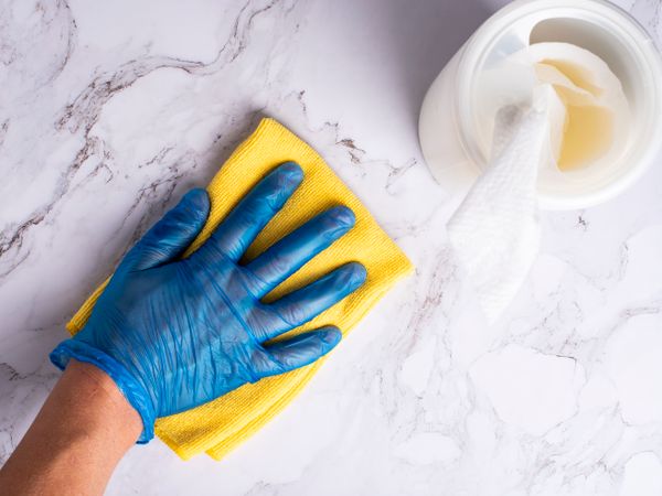 Surface being cleaned with a cleaning wipe