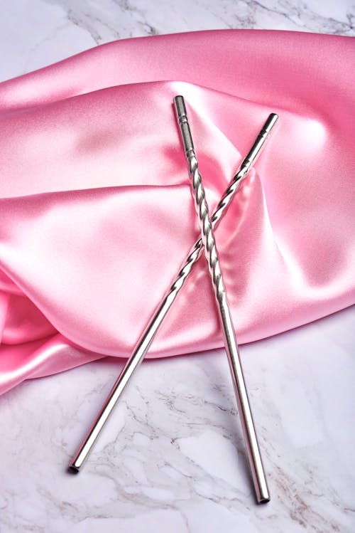 Metal Straw on Pink Silk