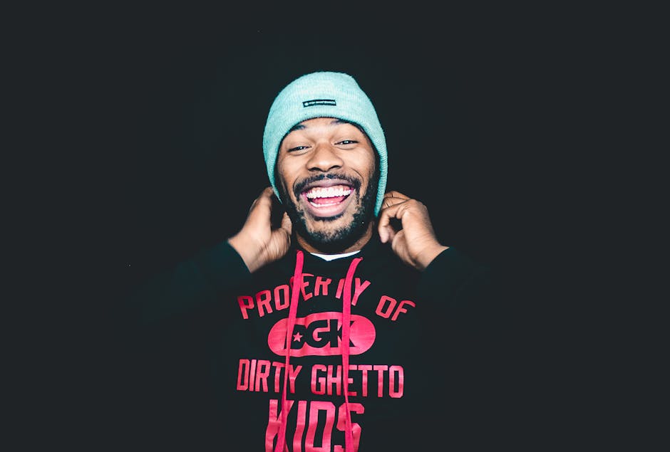 Smiling Man Wearing Black and Red Long-sleeved Shirt