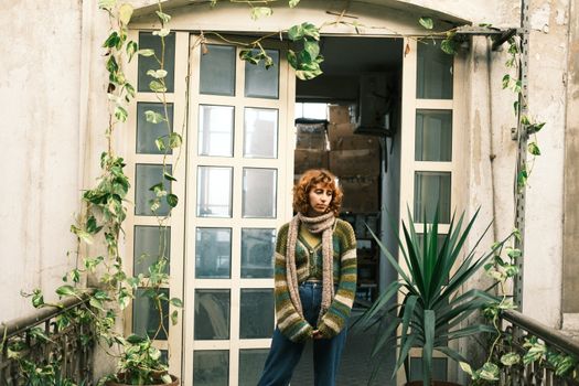 Woman Standing in Doorway