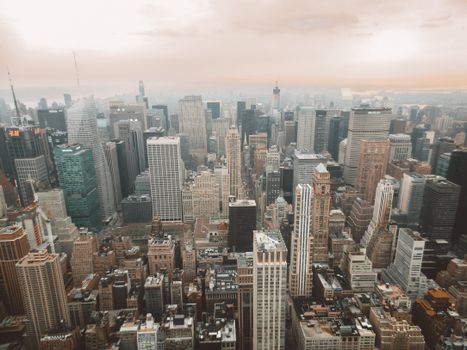 A breathtaking aerial view of New York City's skyline with skyscrapers at dusk.