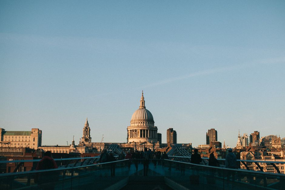 Stunning view of St Paul's Cathedral from the Millennium Bridge in London at sunset.