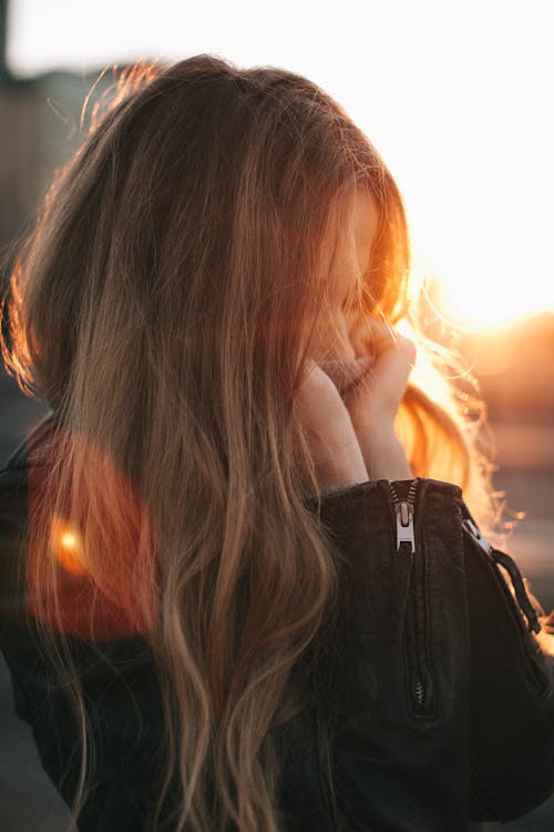 Woman With Hands on Chin