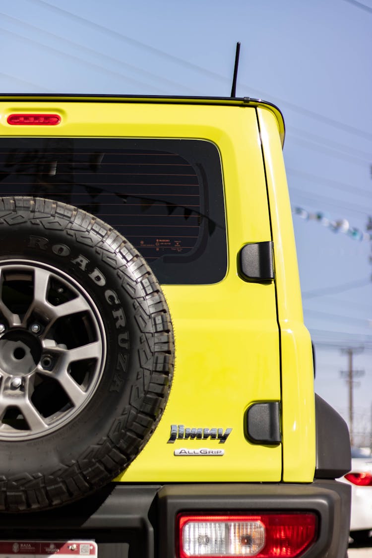 Yellow Jeep On A Street 