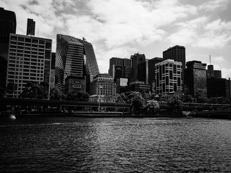 Striking black and white view of a city's urban skyline featuring modern skyscrapers and architecture.
