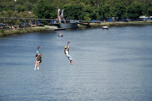 People on Zip Line over Yarra River in Australia