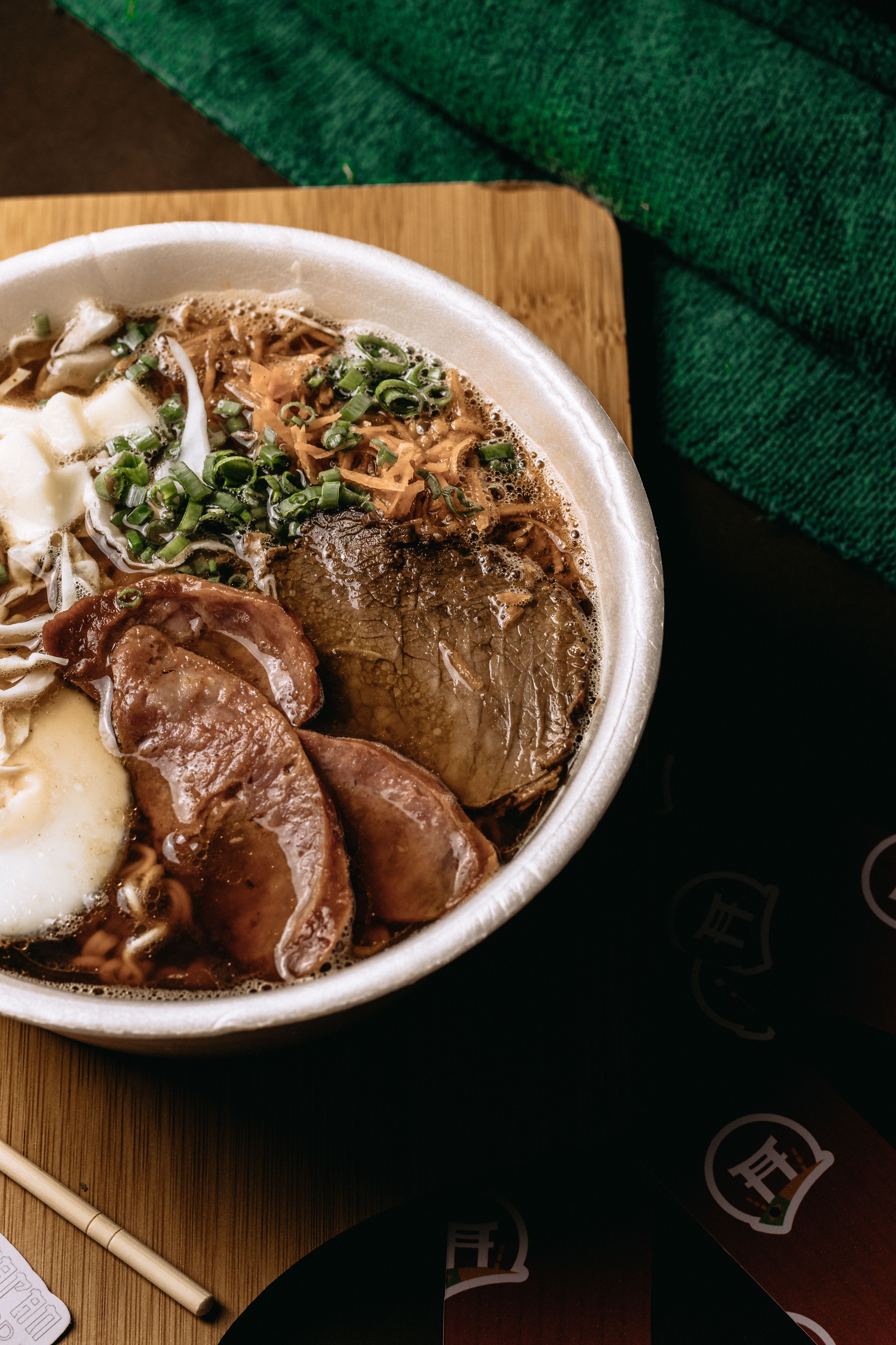 A savory bowl of artisan ramen with beef, perfectly garnished for a delightful meal.