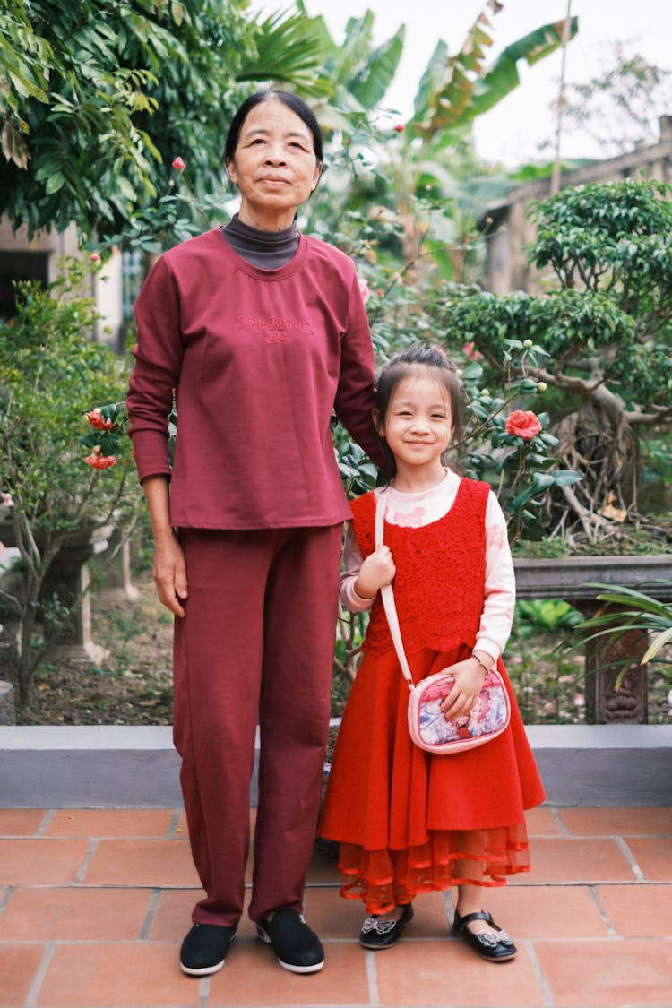 Mother Posing With Daughter