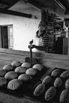 Baker preparing bread in a traditional Mexican bakery in Pahuatlán, Puebla.