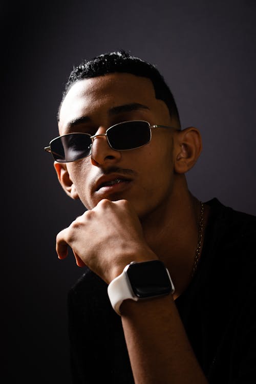 A Young Man with Sunglasses Posing