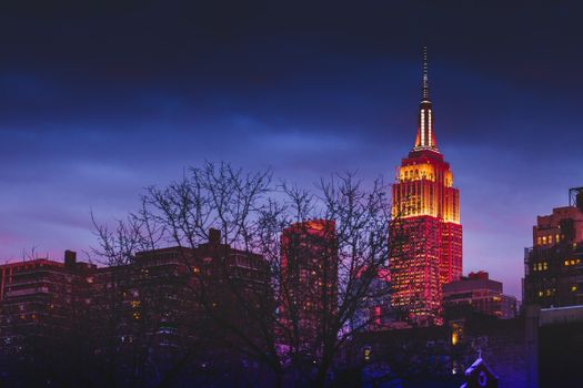 Stunning night view of the illuminated Empire State Building in New York City.