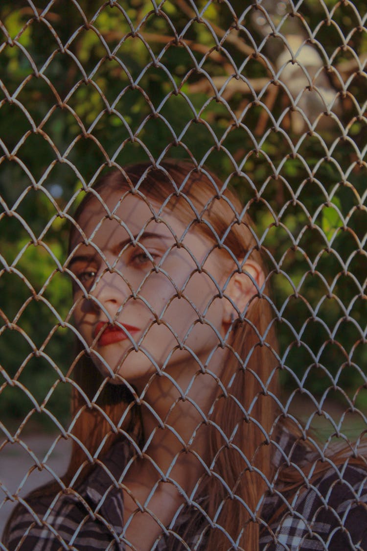 Woman Face Behind Net