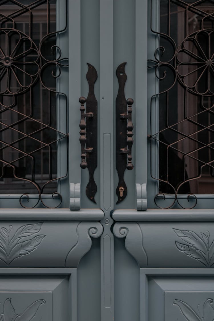 Handles On Ornamented Door