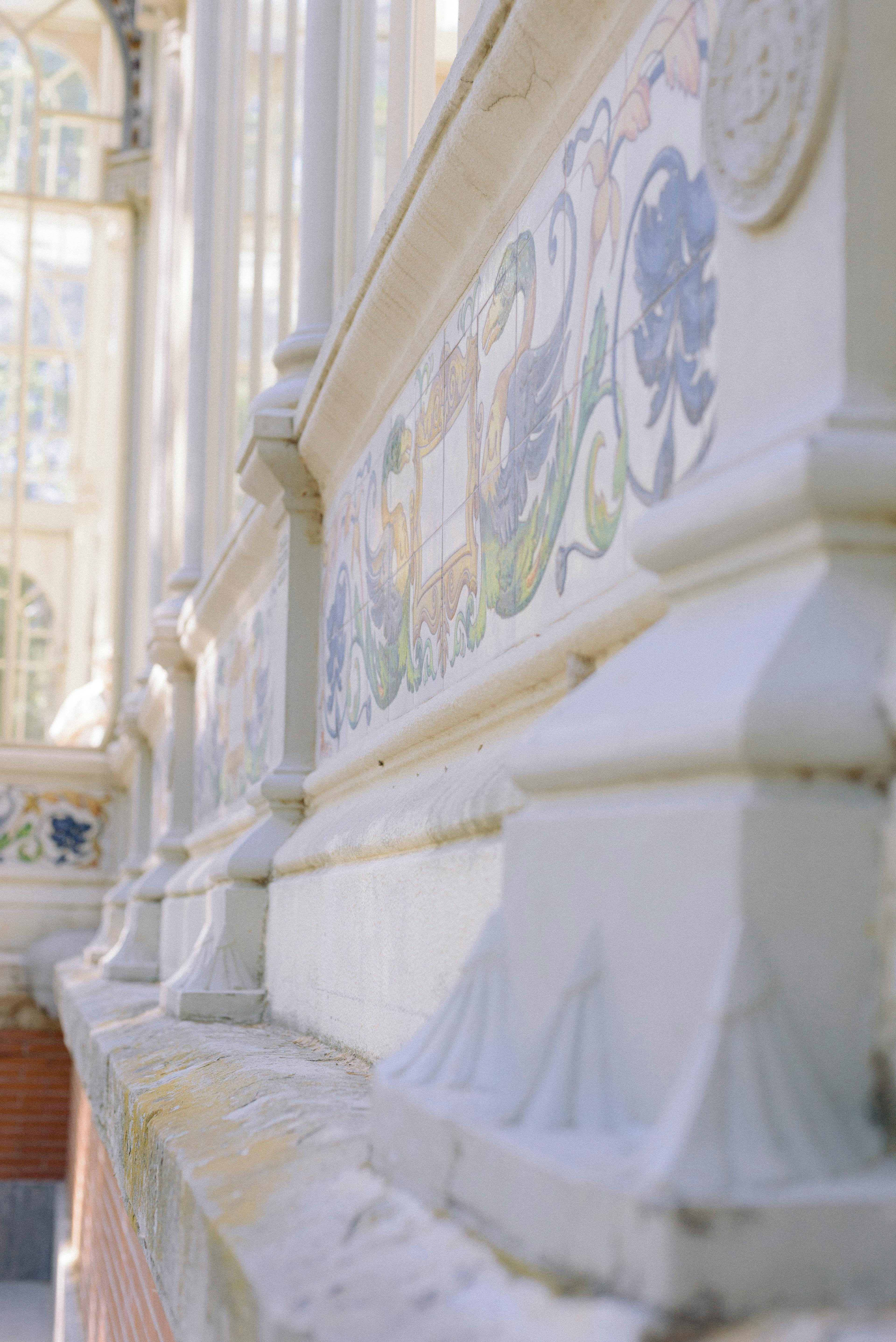 Intricate wall art with decorative details photographed in Madrid, Spain.