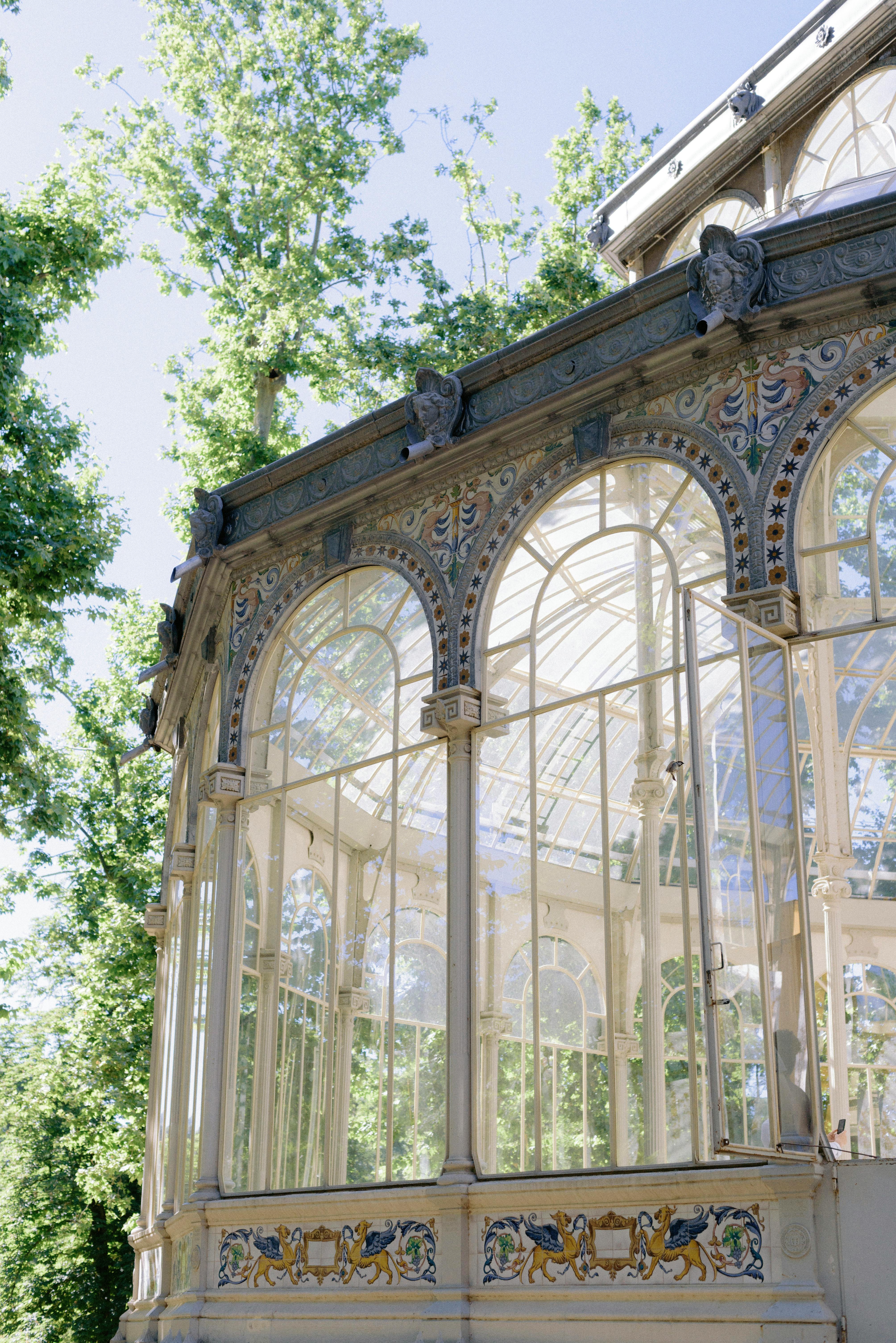 arched glass windows of the glass palace in madrid spain