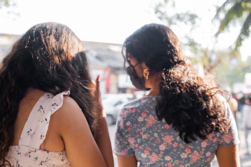 back profile of two girls