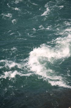 A huge, vibrant chunri (scarf) displayed as a tribute to an MP, celebrating the Narmada River.  A symbol of honour and regional pride.