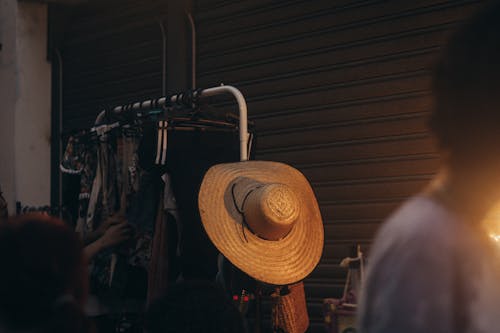 Hat Hanging on a Clothing Rack