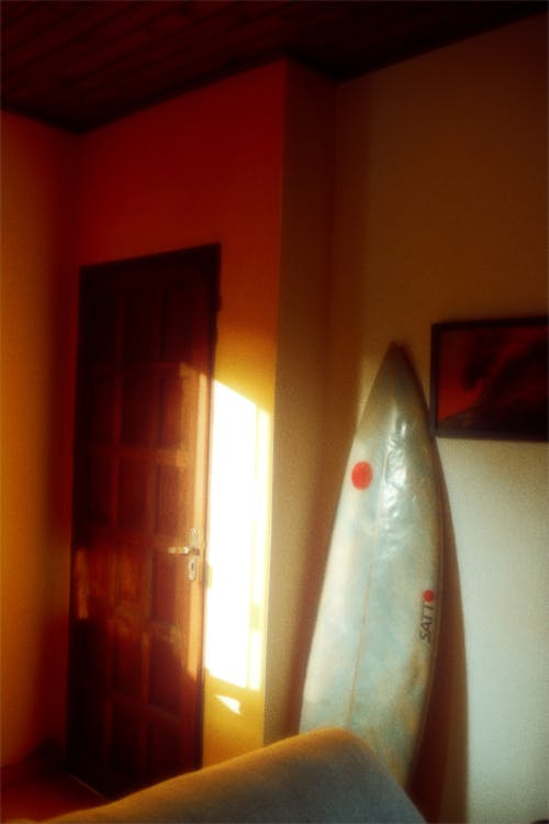 Surfboard near Wall in Room